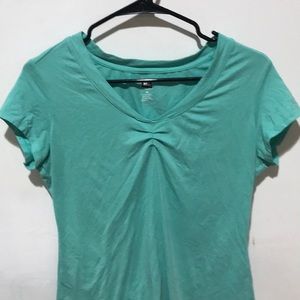 REI teal short sleeve shirt
